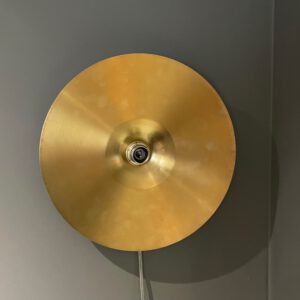 Discus wandlamp.